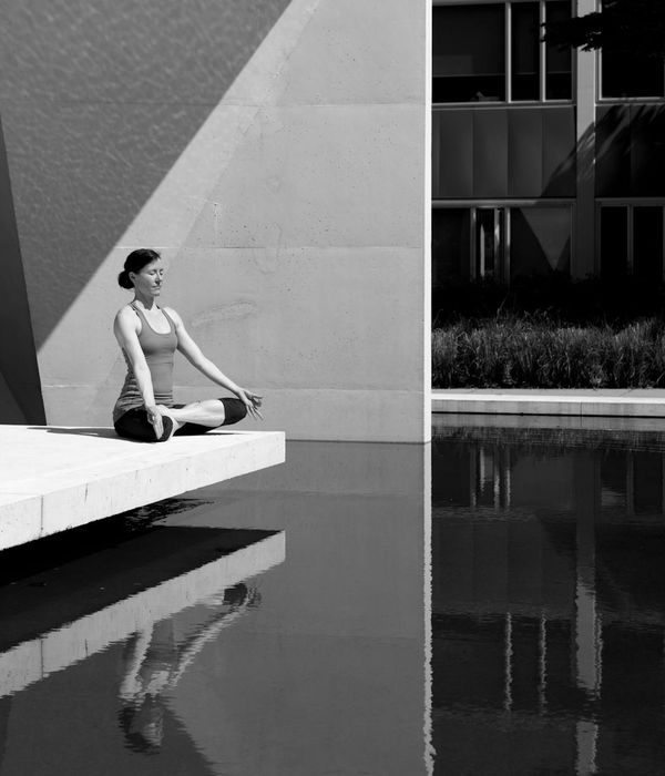 Person meditating in a calm and serene environment, symbolizing mental clarity.